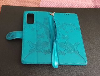 Custodia per cellulare turchese con fiori e farfalle