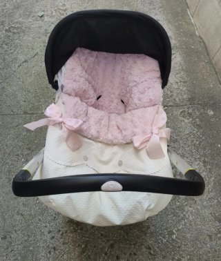Silla de coche y paseo Doona