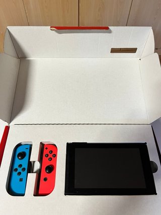 Nintendo Switch Azul y Rojo + Funda