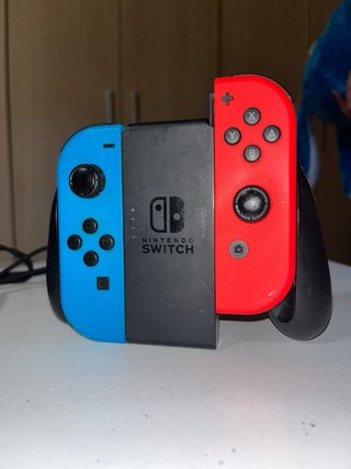 Nintendo Switch Azul y Rojo + Funda