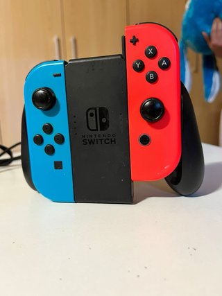 Nintendo Switch Azul y Rojo + Funda