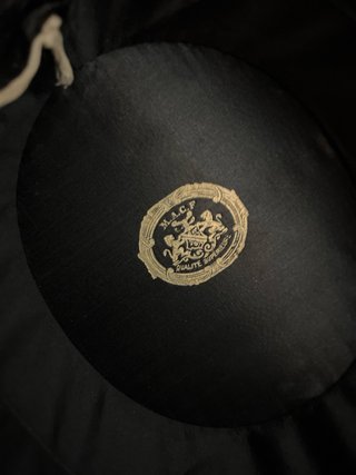 Antiguo sombrero de copa alta de seda