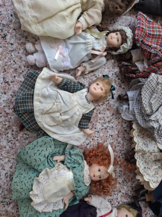Lote de 11 muñecas de porcelana antiguas