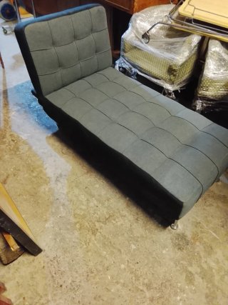 Sofá cama gris de tela