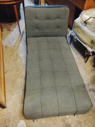 Sofá cama gris de tela