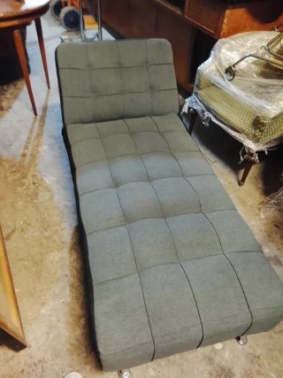 Sofá cama gris de tela