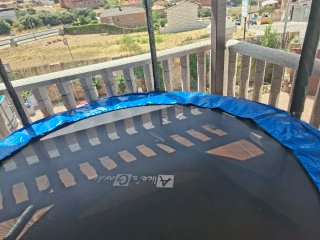 Cama elástica con red de seguridad