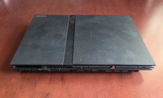PlayStation 2 + 2 Comandi + Giochi