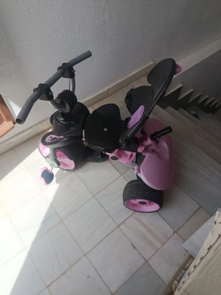 Triciclo infantil rosa y negro
