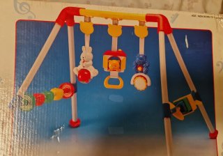 Gimnasio para bebé con juguetes