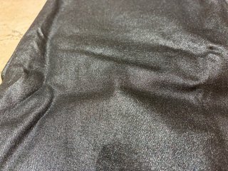 Pantalón flare brillo negro campana