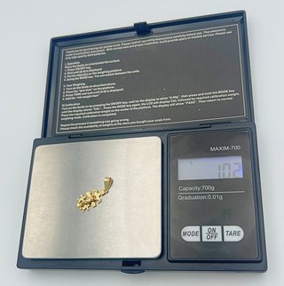Cruz 18k Oro 1.02 gr