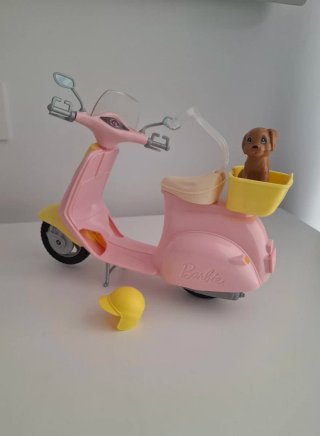 Moto Barbie rosa y amarilla con perrito