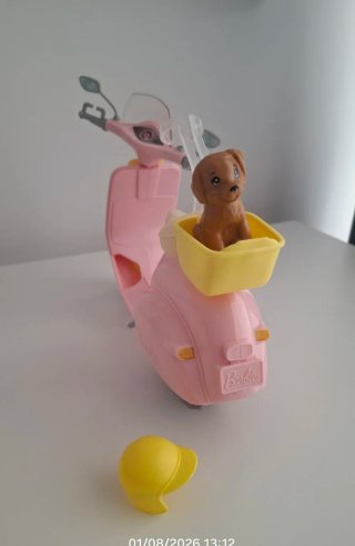 Moto Barbie rosa y amarilla con perrito