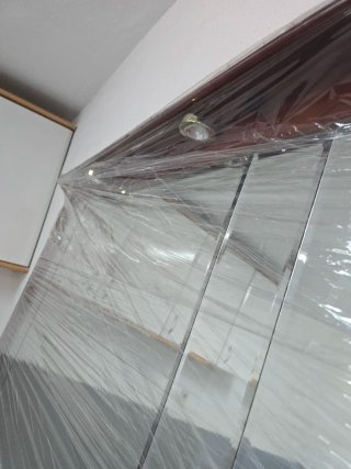 Espejo grande de madera y cristal