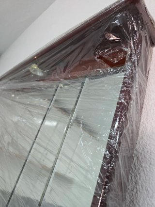 Espejo grande de madera y cristal