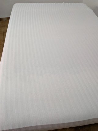 Colchón de tela,con el protector , negociable