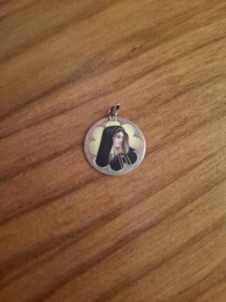 Antigua medalla siglo XX