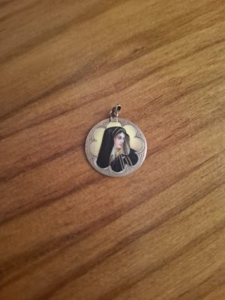 Antigua medalla siglo XX