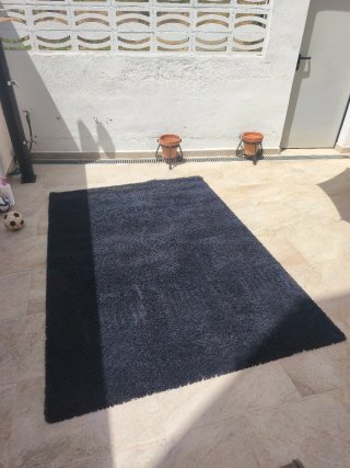 Alfombra IKEA azul pelo largo