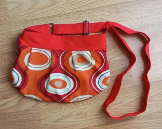 Bolso estampado naranja y rojo