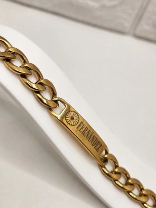Pulsera apellido Fernández Acero baño oro