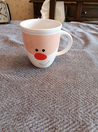 Taza divertida cara de Papá Noel