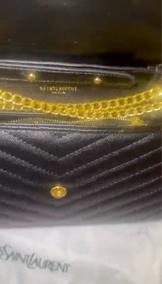 Borsa Yves Saint Laurent nera con catena oro