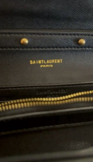 Borsa Yves Saint Laurent nera con catena oro