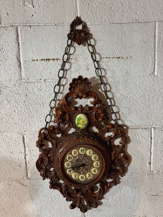 Orologio da parete antico in legno