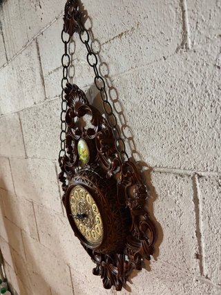 Orologio da parete antico in legno