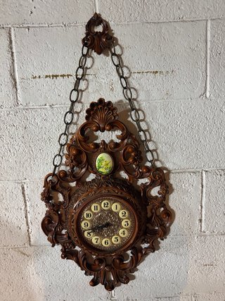 Orologio da parete antico in legno