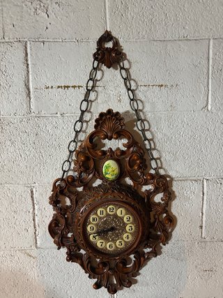 Orologio da parete antico in legno