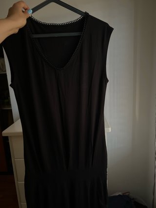 Macacão preto, veste ate L
