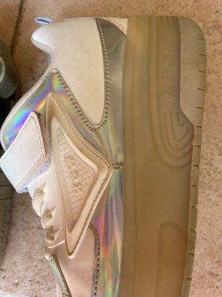 Scarpe da ginnastica con ruote bianche e argento