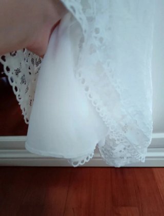 Abito in pizzo bianco