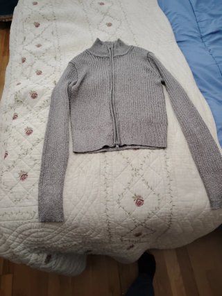 Chaqueta de punto gris con cremallera