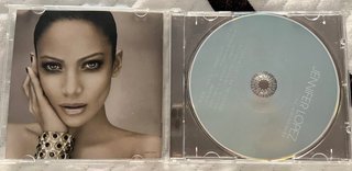 CD Jennifer López - Como Ama Una Mujer