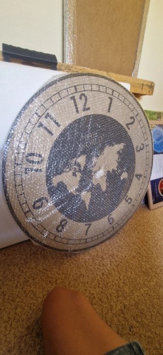 Reloj de pared decorativo mundo