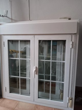 Ventanas de aluminio con persiana y mosquitera