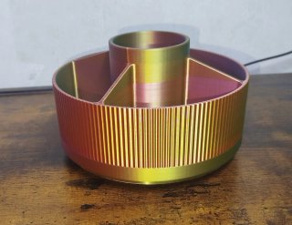 Portaoggetti con base girevole