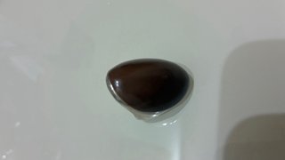Anillo ovalado marrón y plateado