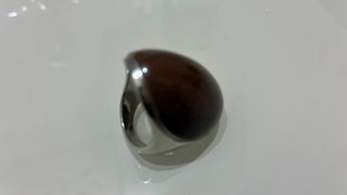 Anillo ovalado marrón y plateado