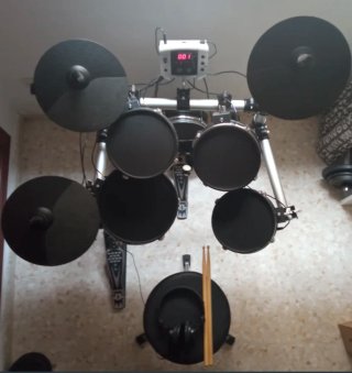Batería Millenium eléctrica con cascos