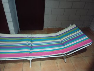 Tumbona 65cm ancho x 1,85m. Plegada queda en 68x64