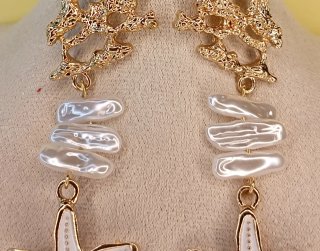 Pendientes largos marinos con perlas y estrellas