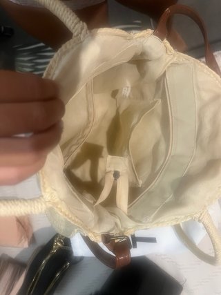 Bolso redondo de rafia