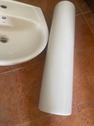 Lavabo de cerámica blanco