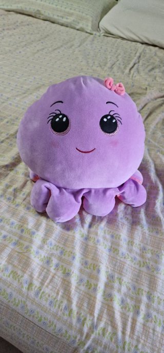 Peluche polpo viola con fiocco