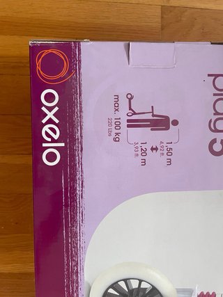 Patinete Oxelo Play 5 Blanco y Morado. Junior